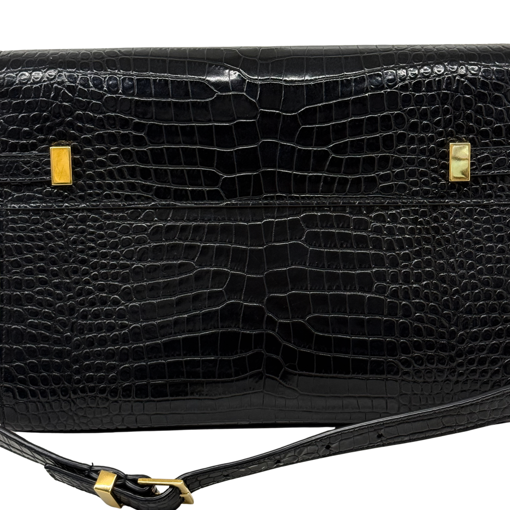 Black croc-embossed leather front flap with gold-tone snap buttons