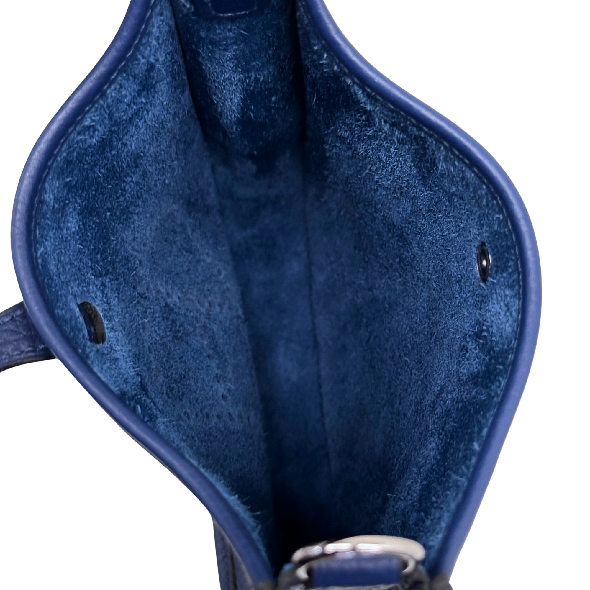 Navy blue leather interior of Evelyne 16 crossbody bag with seam detailing