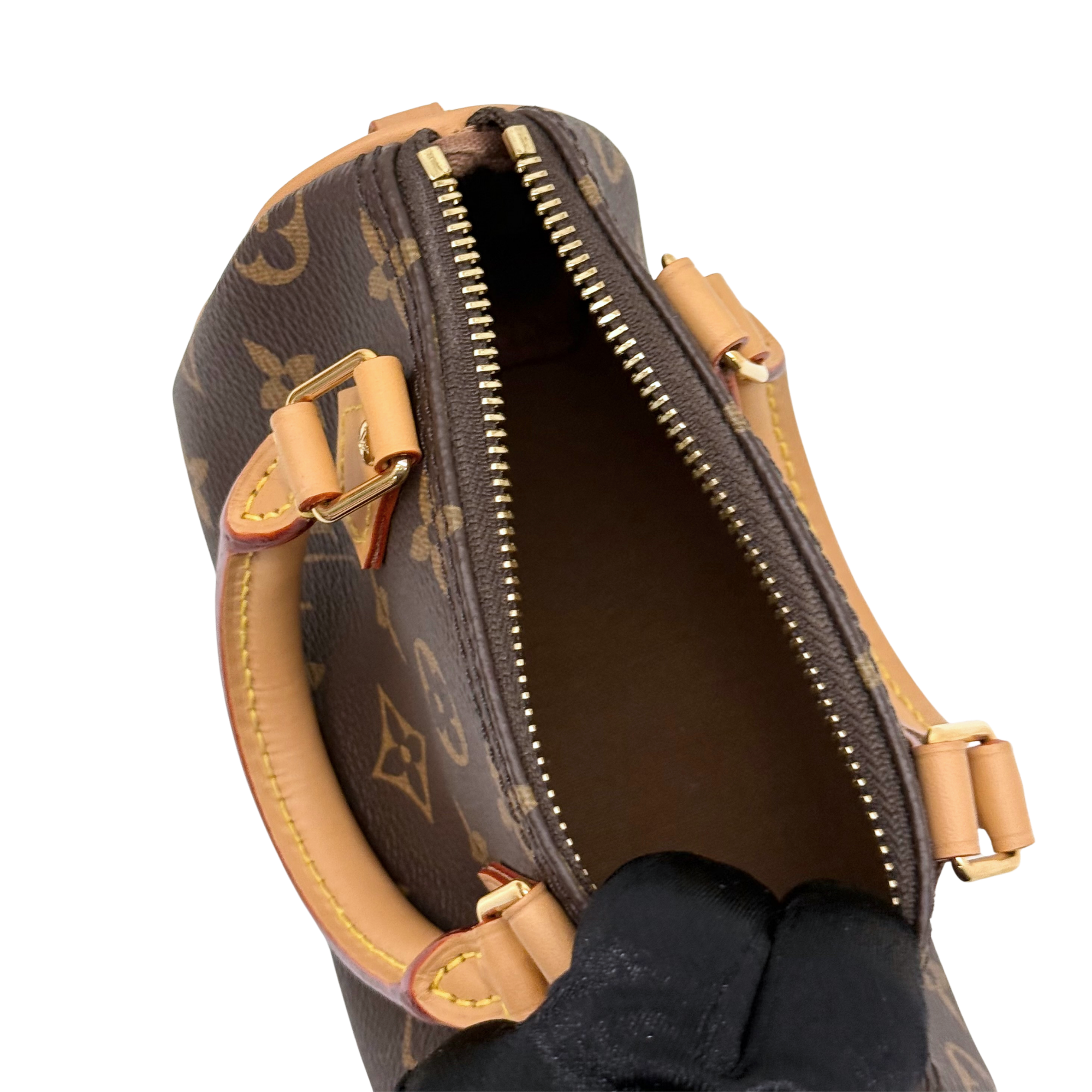 Louis Vuitton monogram canvas handbag interior with zipper, leather trim, and strap
