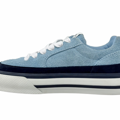 Close side view of blue suede sneaker with white laces and black trim