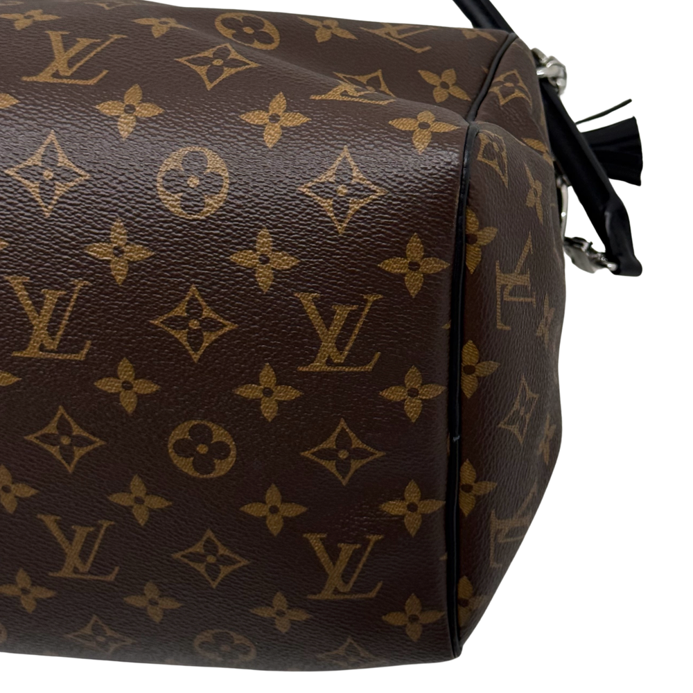 Louis Vuitton pre-owned monogram duffel bag front panel with leather trim and stitching