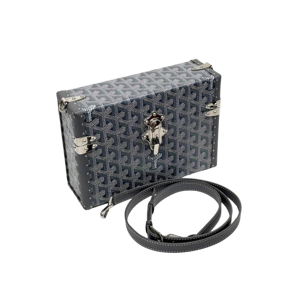 Goyard patterned mini trunk with leather straps and silver hardware, dark and light tones