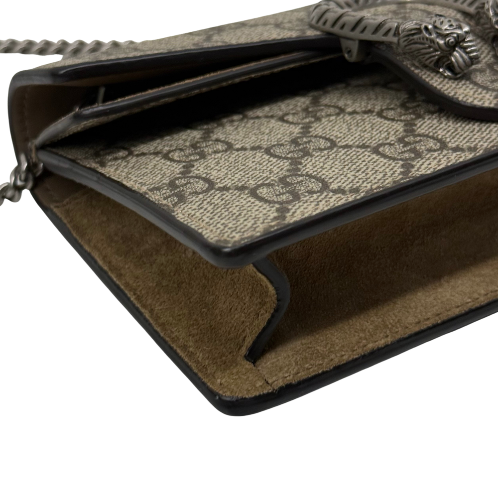 Gucci shoulder bag open view with tan lining and GG canvas interior