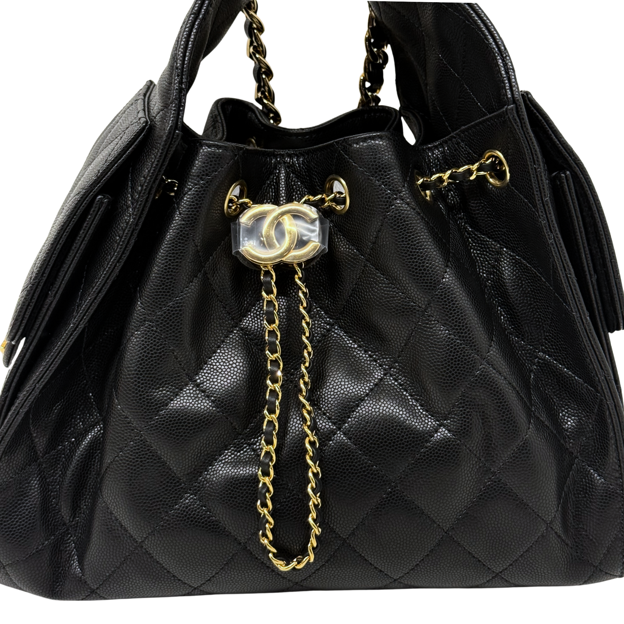 Black quilted Chanel bag front view with CC logo medallion and long gold chain