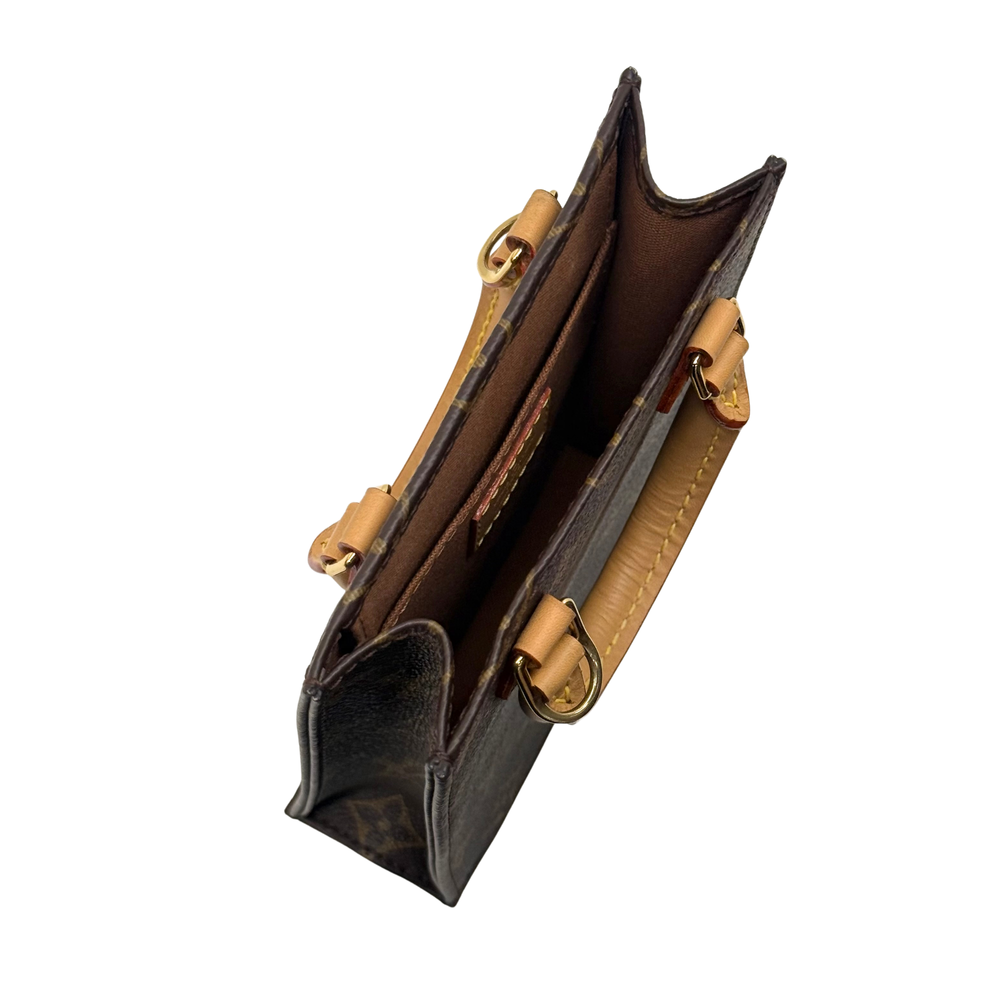 Pre-owned Louis Vuitton monogram handbag, side view with zipper pocket and adjustable strap