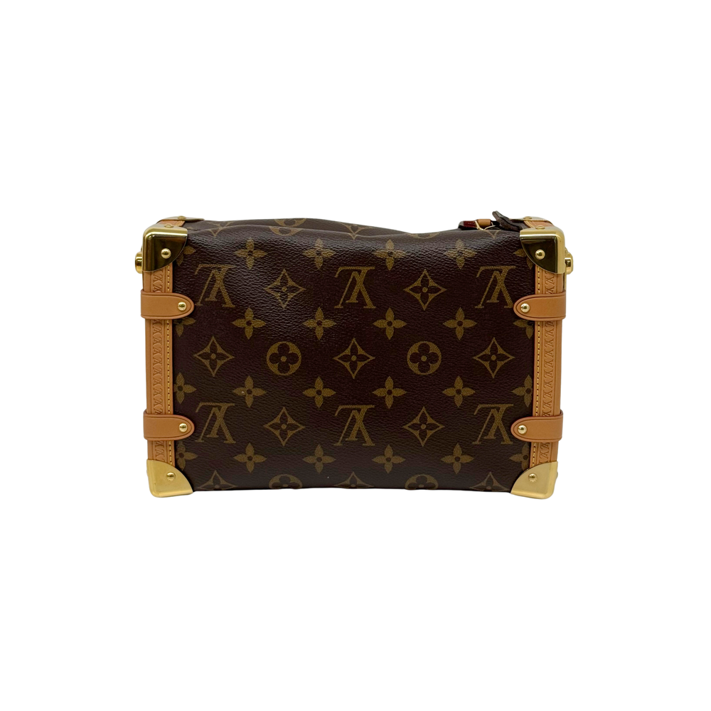 Monogram canvas crossbody bag front view with tan leather trim and gold corner hardware