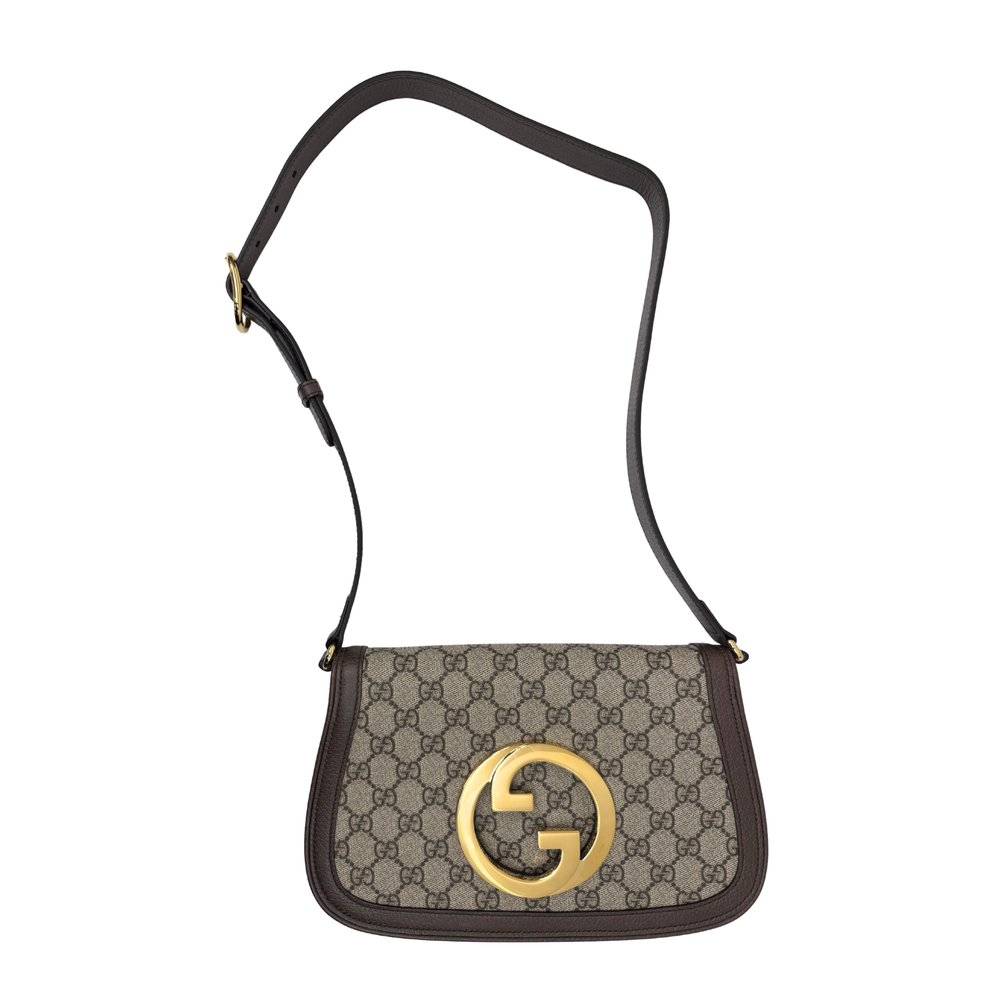 Gucci small GG canvas crossbody bag with adjustable strap and gold-tone G clasp