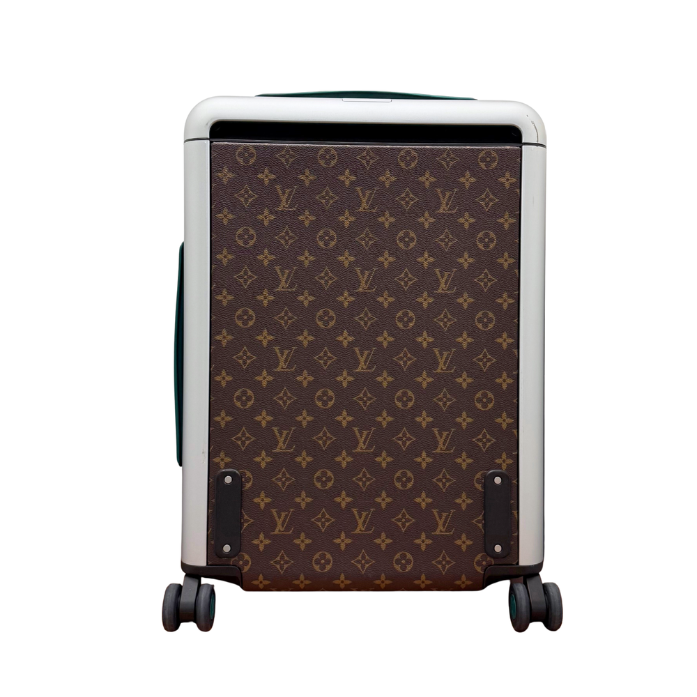 Pre-owned Louis Vuitton trunk suitcase with monogram canvas and white trim, corner protectors, wheels
