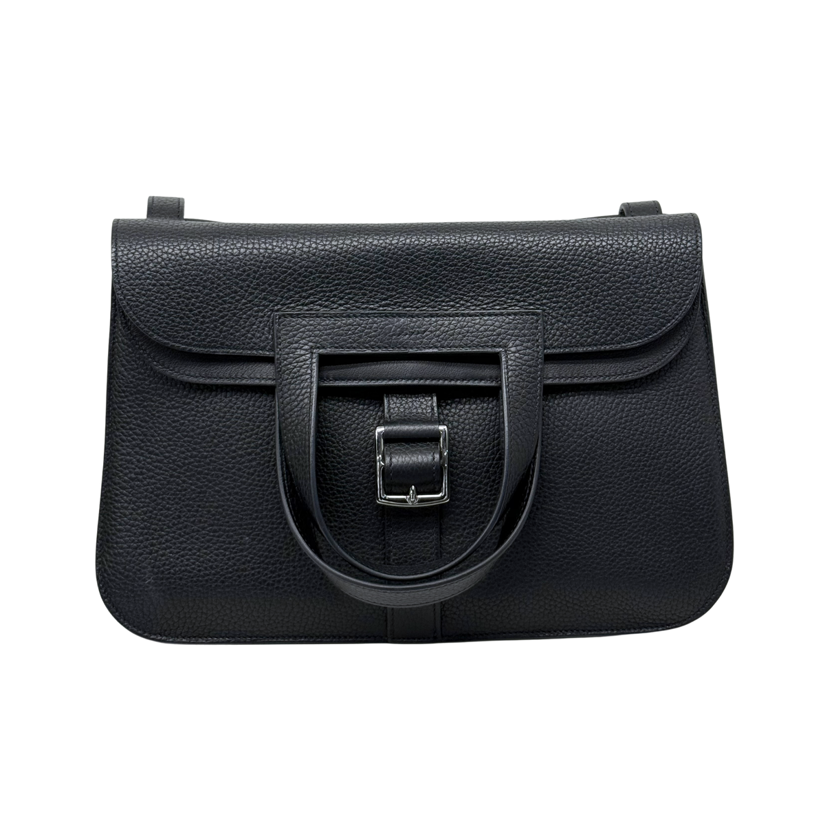 Black leather tote bag with structured flap and front buckle detail