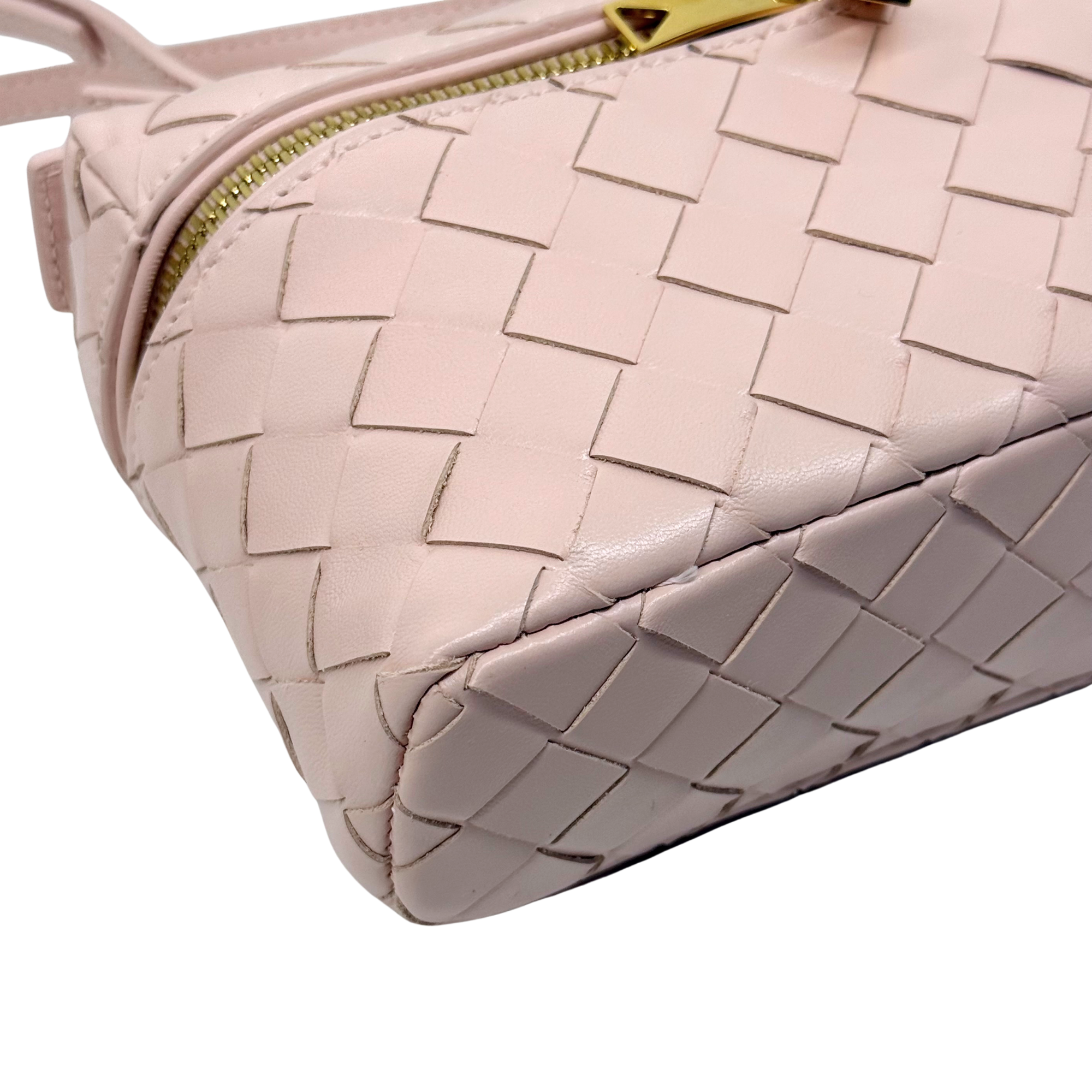 Bottega Veneta pale pink leather woven design with gold zipper pull