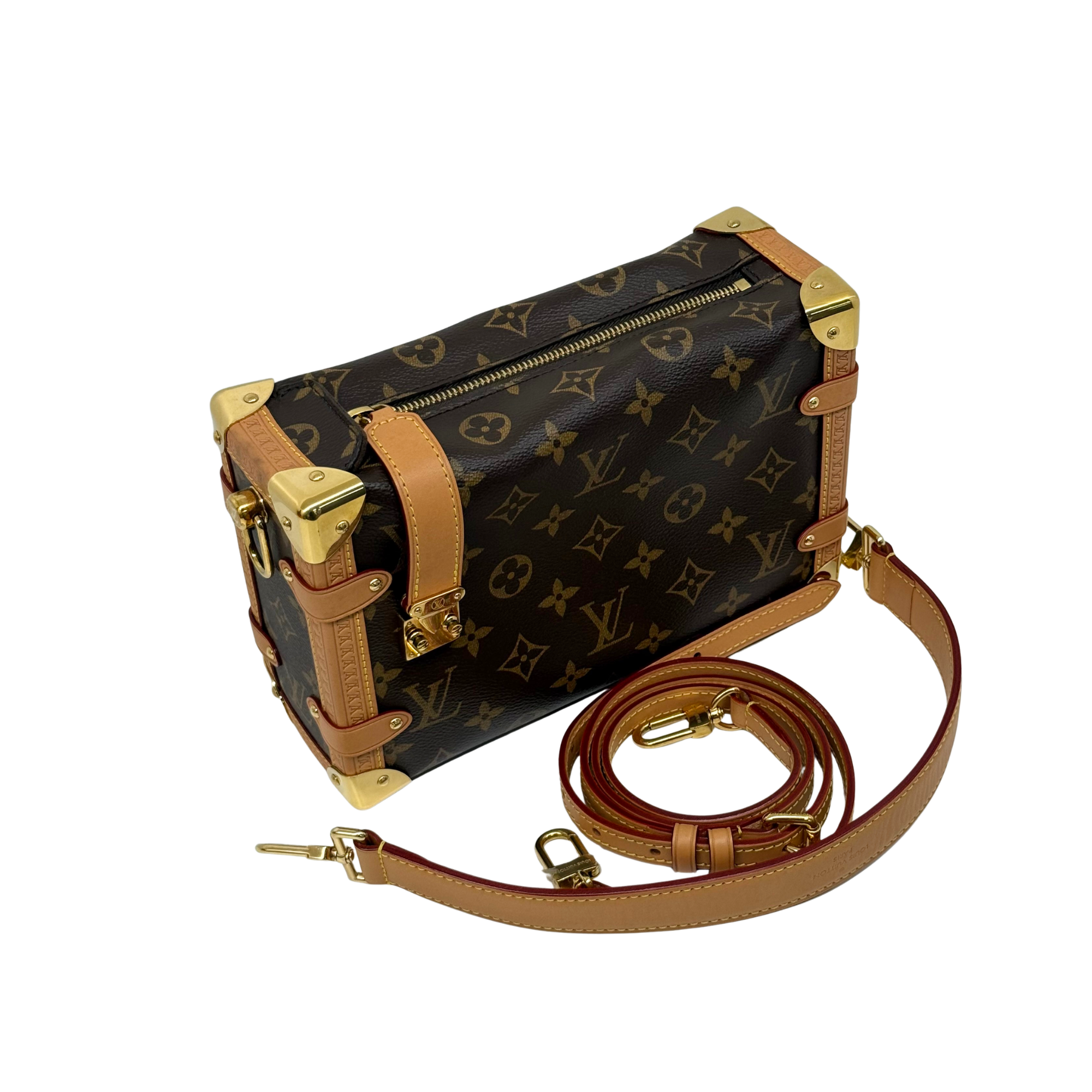 Monogram canvas crossbody bag with tan shoulder strap, gold clasp and side buckle