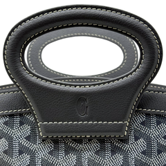 Pre-owned Goyard bag front handle mount with stitched black leather tab and emblem