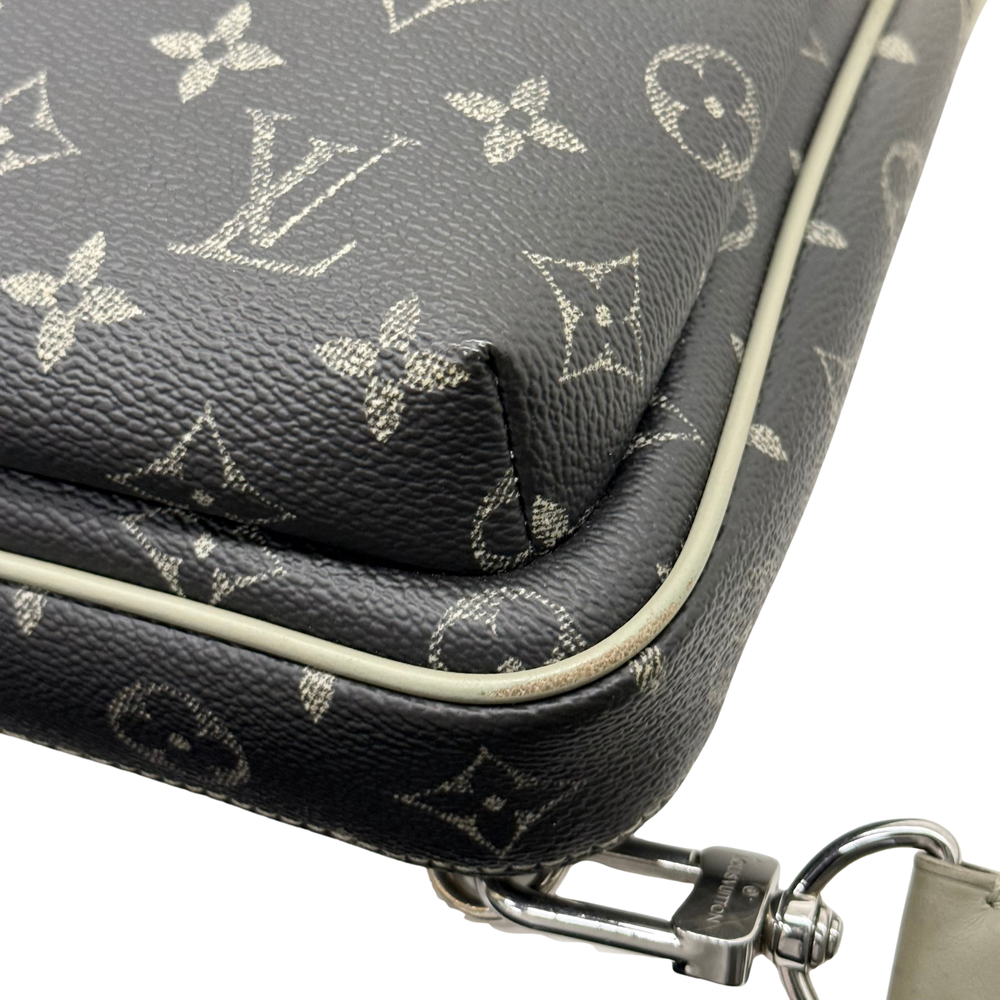 Louis Vuitton monogram crossbody bag front detail with trim edge and metal clasp