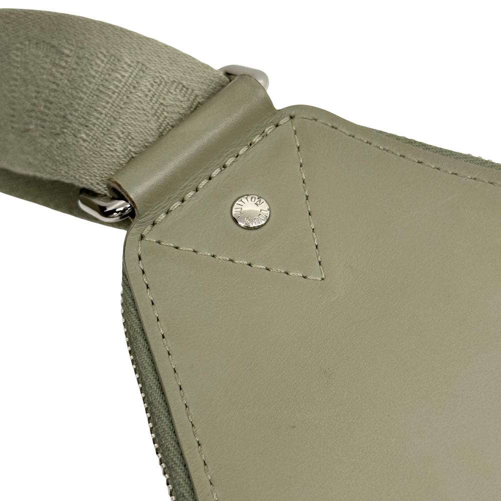 Pre-owned crossbody bag side button patch with round metal logo detail