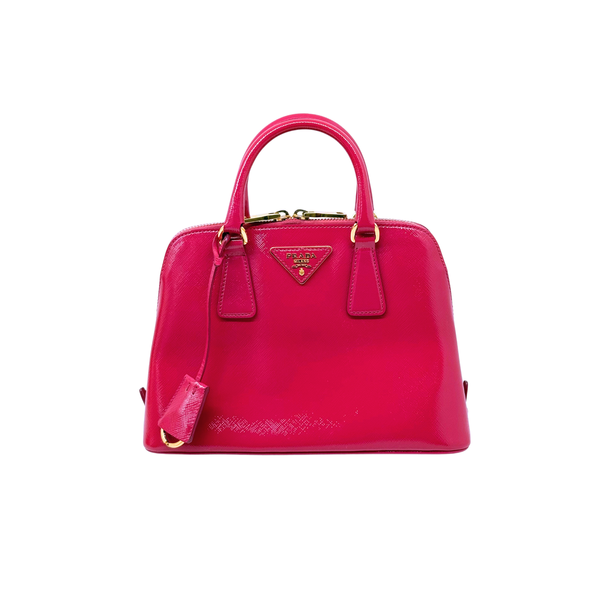 Pink Prada handbag with top handles and triangular logo plaque