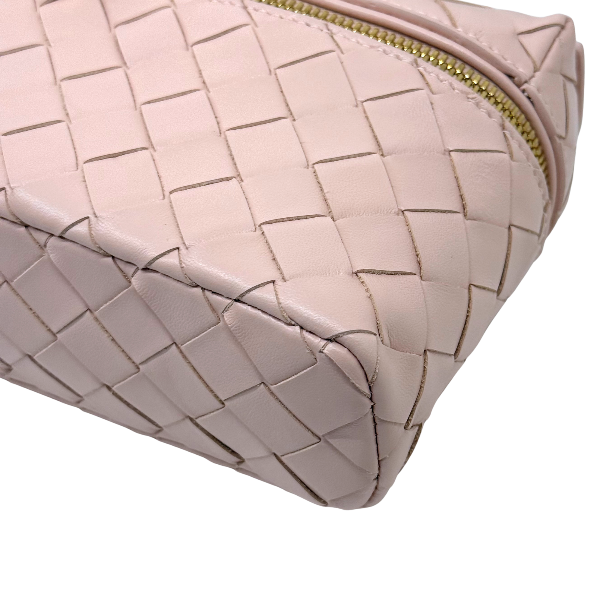 Bottega Veneta pink leather woven bag corner with stitched panel and zip edge