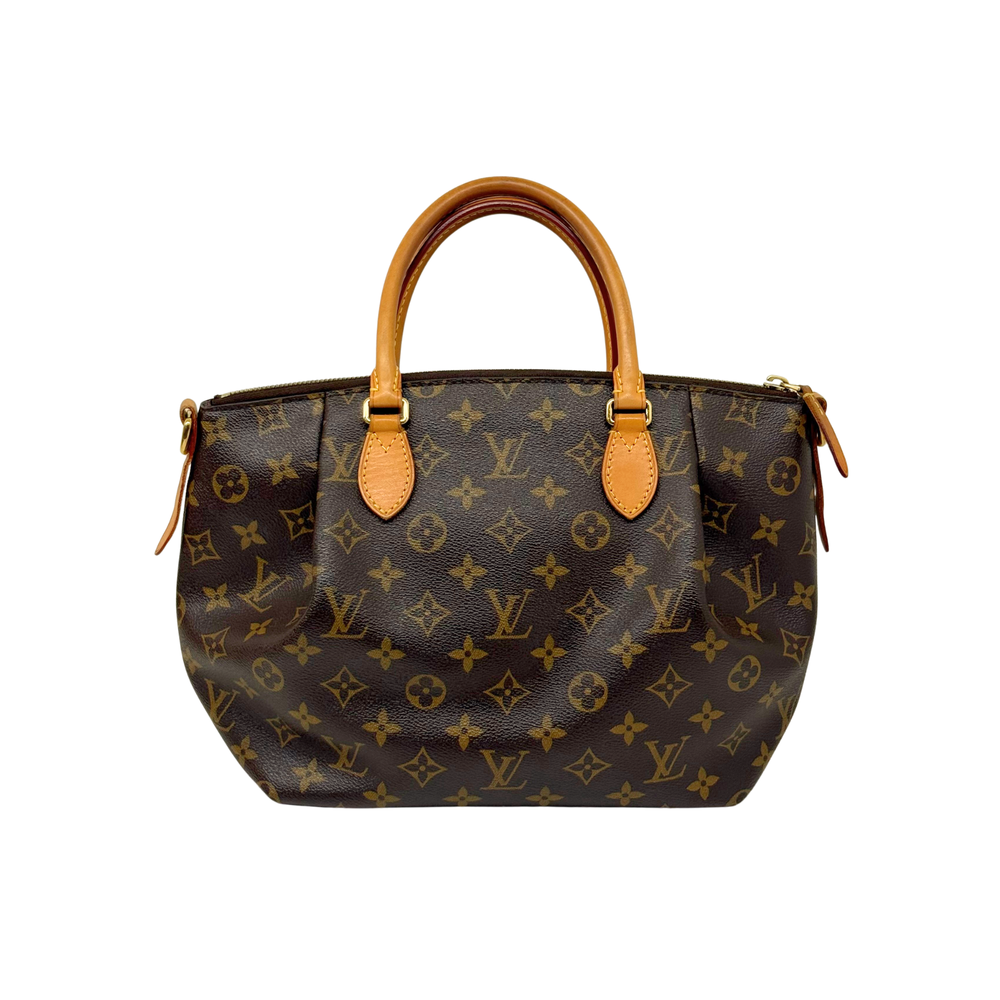 Louis Vuitton monogram handbag front with leather handles and side tie details