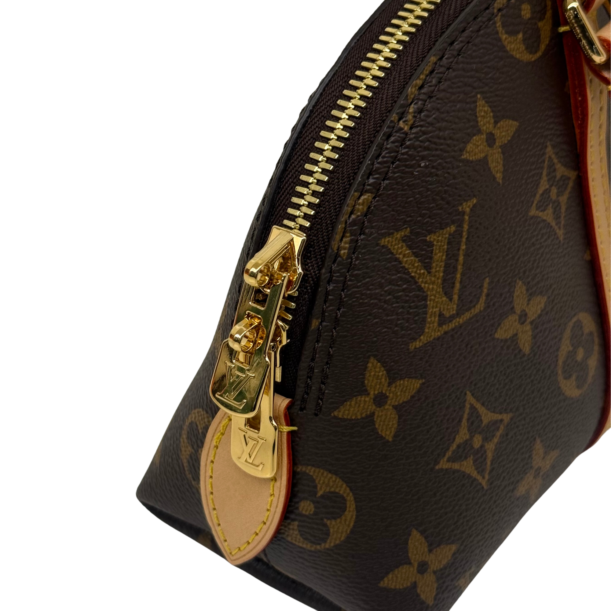 Monogram bag side close-up with gold zipper and key hardware
