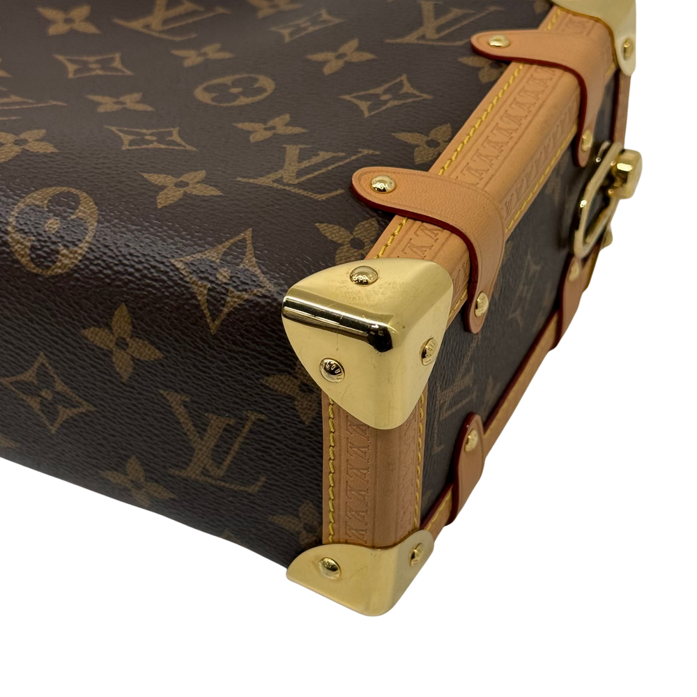 Louis Vuitton monogram mini bag end corner with gold-tone cap hardware and tan leather band
