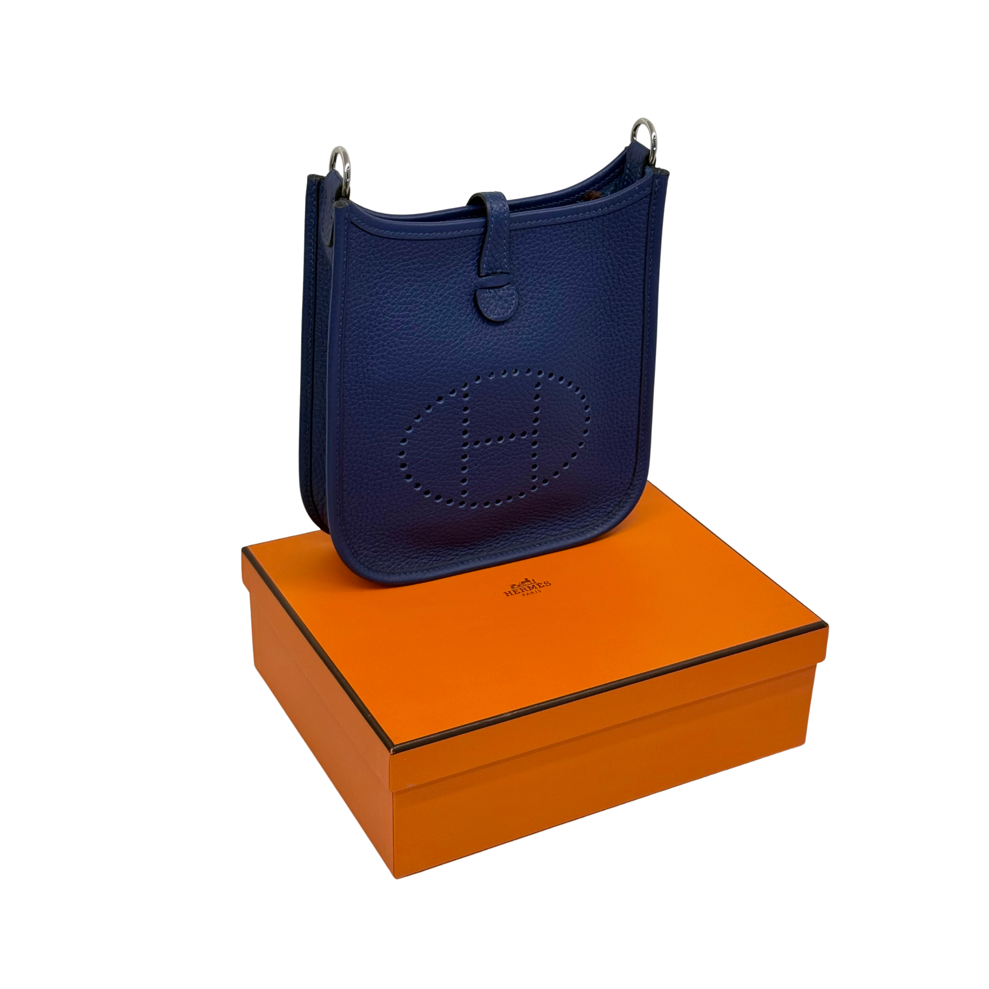 Navy blue Evelyne 16 crossbody bag in textured leather with front perforated logo