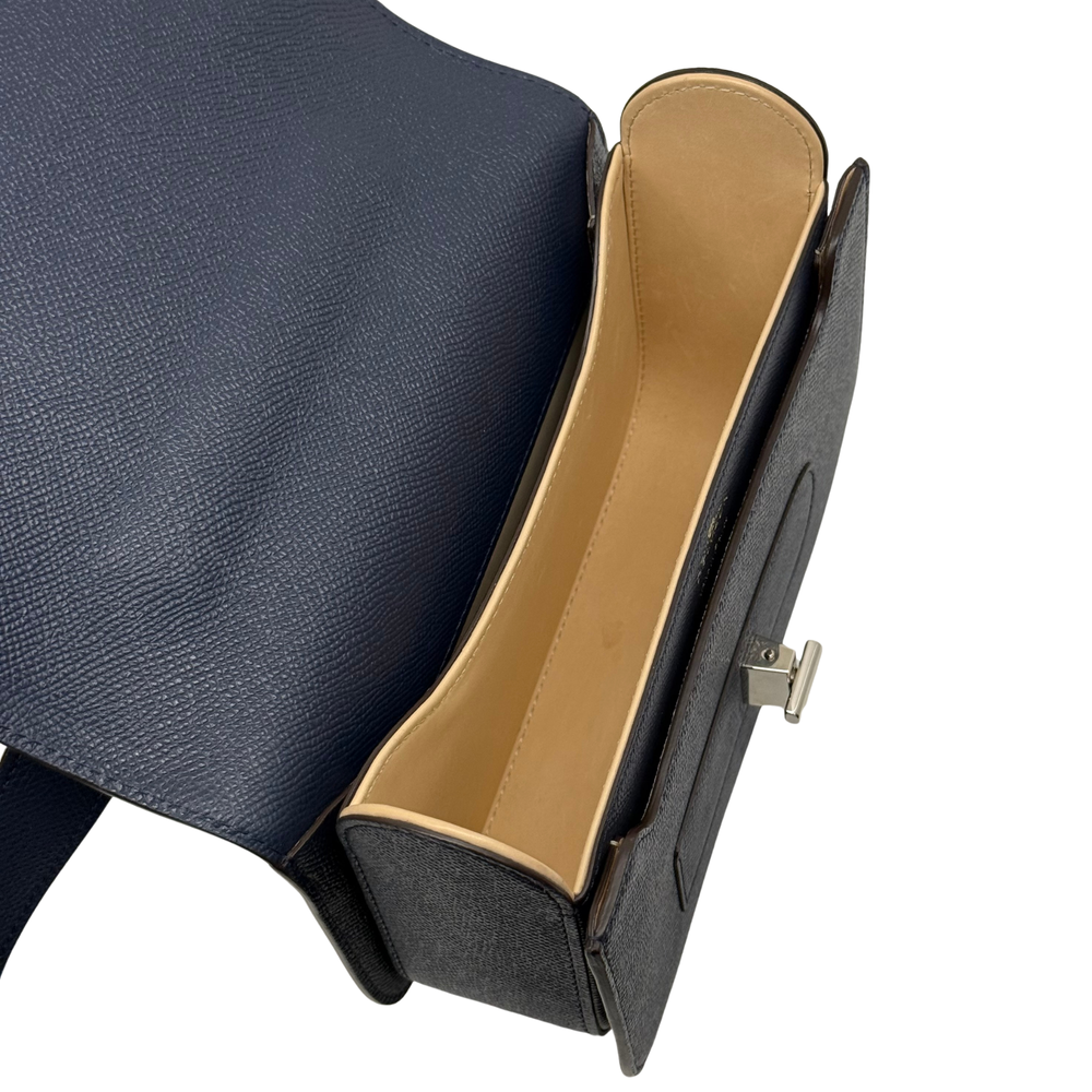Pre-owned Delvaux shoulder bag interior view with tan lining and side clasp detail