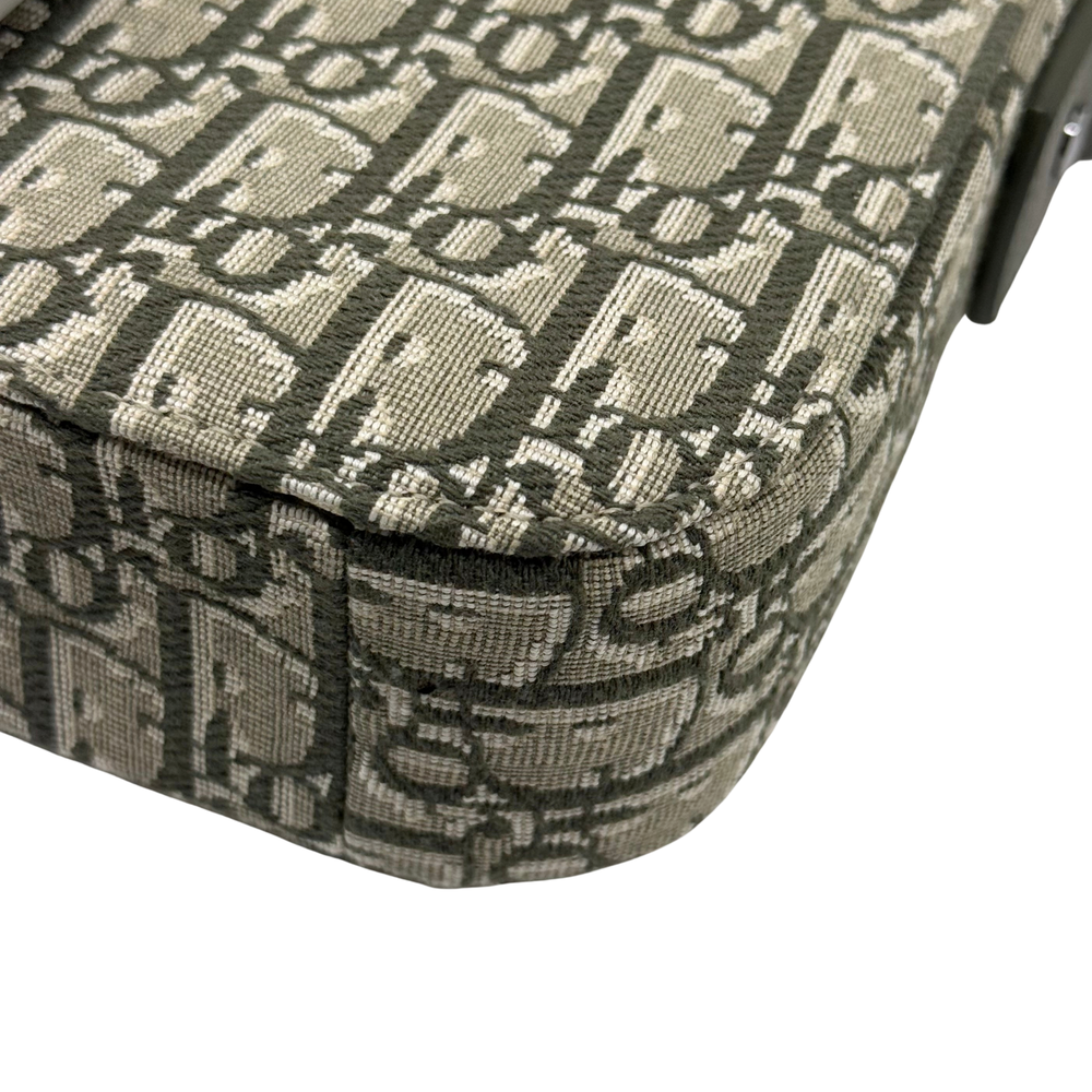 Dior monogram canvas bag corner with woven texture and stitched trim