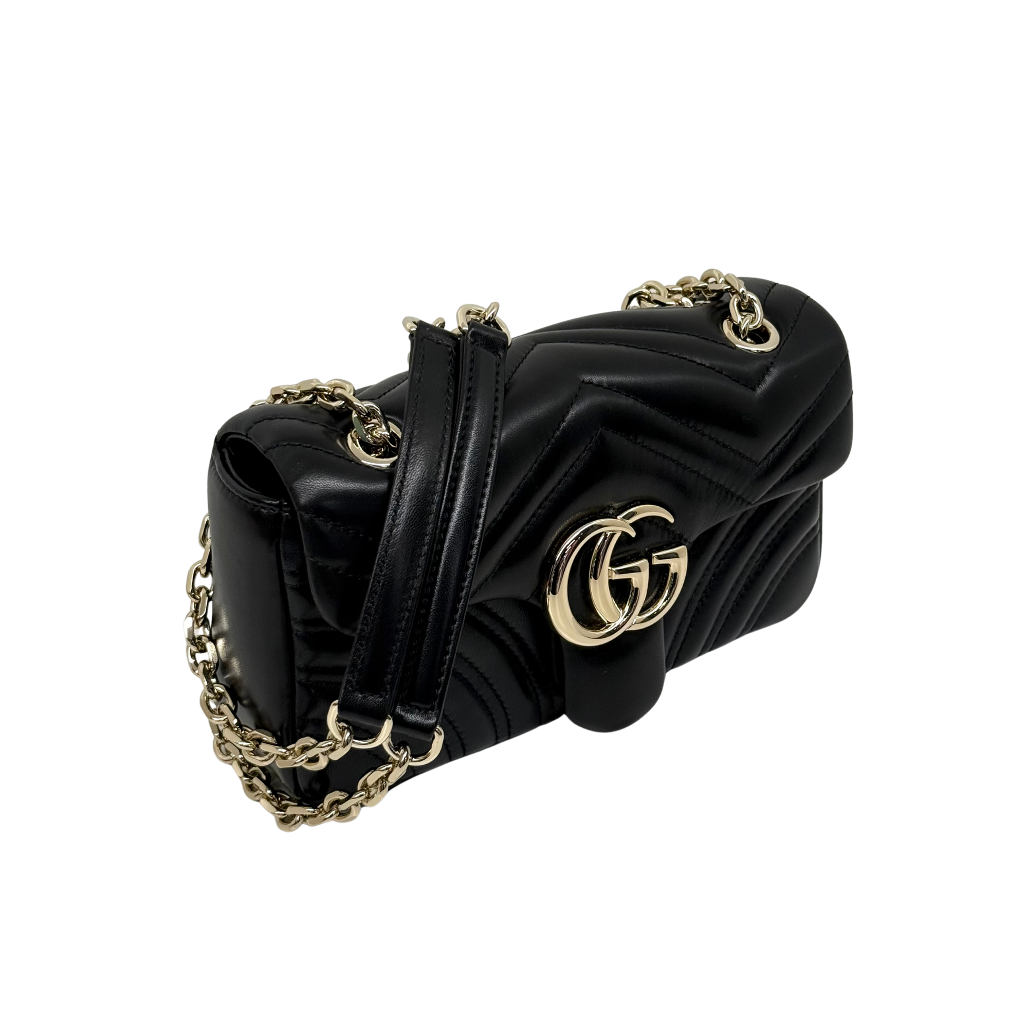 Gucci shoulder bag side view with black chevron quilting, gold double-G logo, chain strap