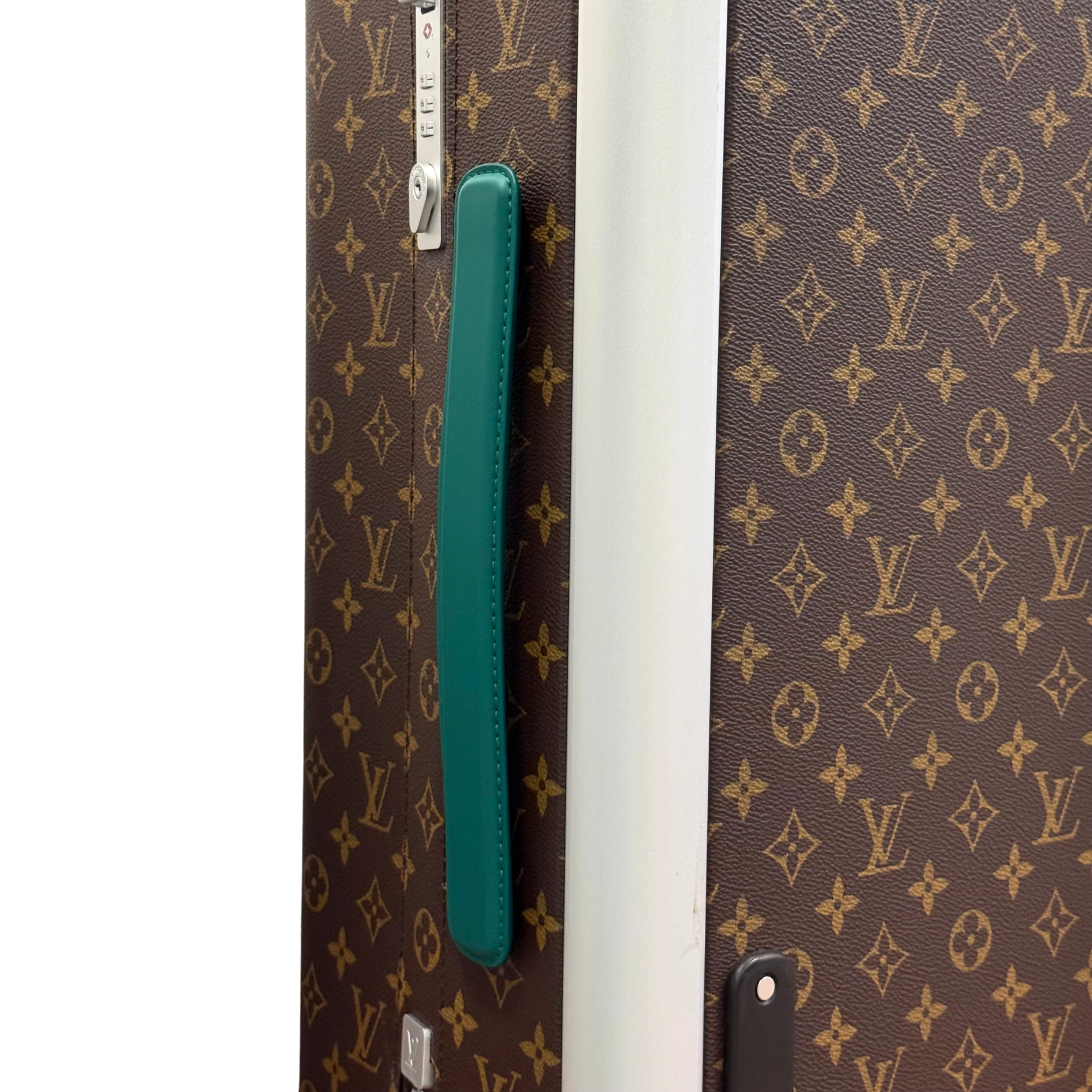Pre-owned rolling suitcase side, teal strap and monogram pattern with metal hardware