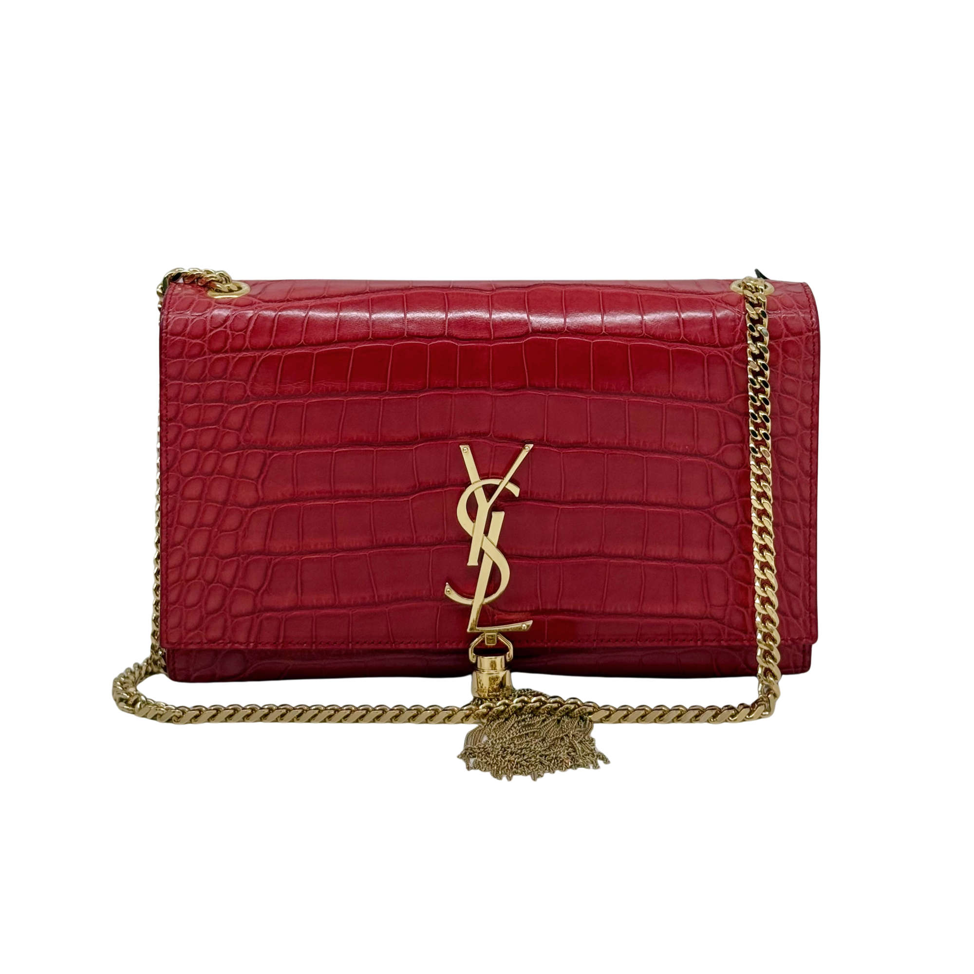 Red crocodile-embossed leather shoulder bag with gold chain, YSL monogram, and tassel