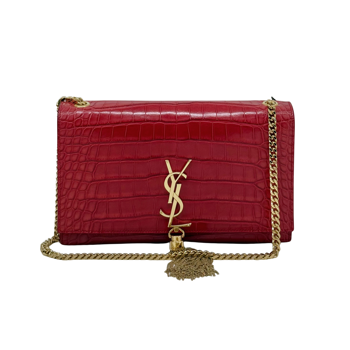 Red crocodile-embossed leather shoulder bag with gold chain, YSL monogram, and tassel