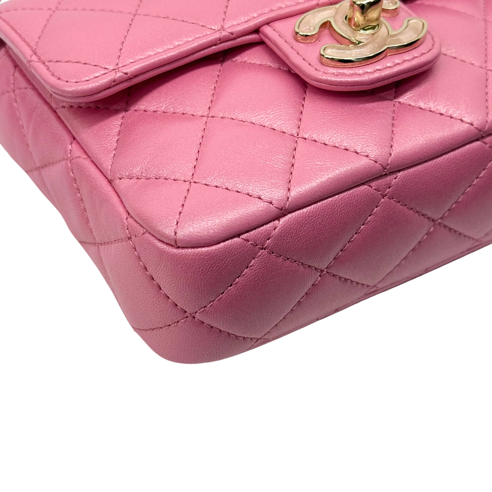 Pink quilted leather mini bag corner with gold clasp hardware