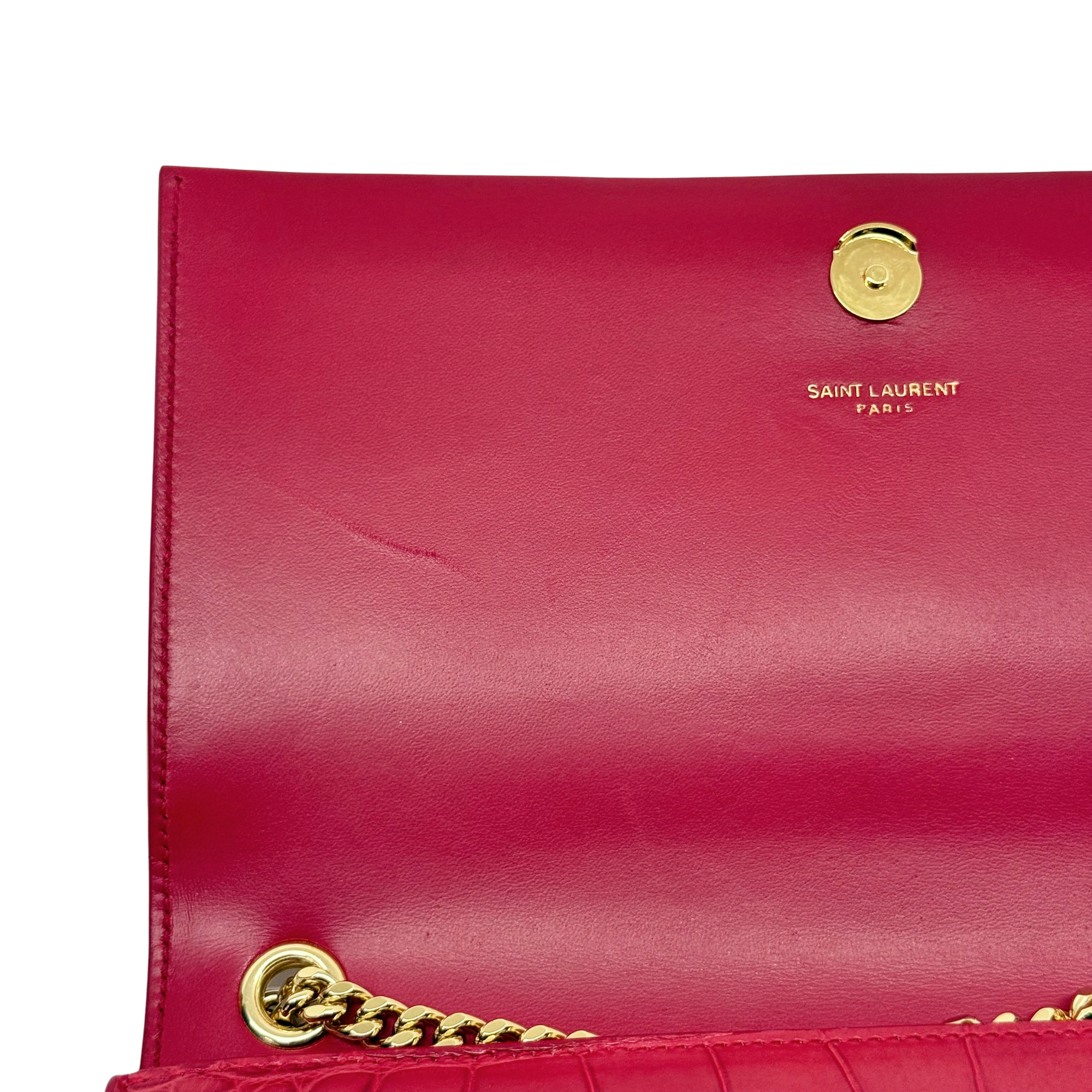 Red leather crossbody flap clutch with gold-tone button closure and SAINT LAURENT mark