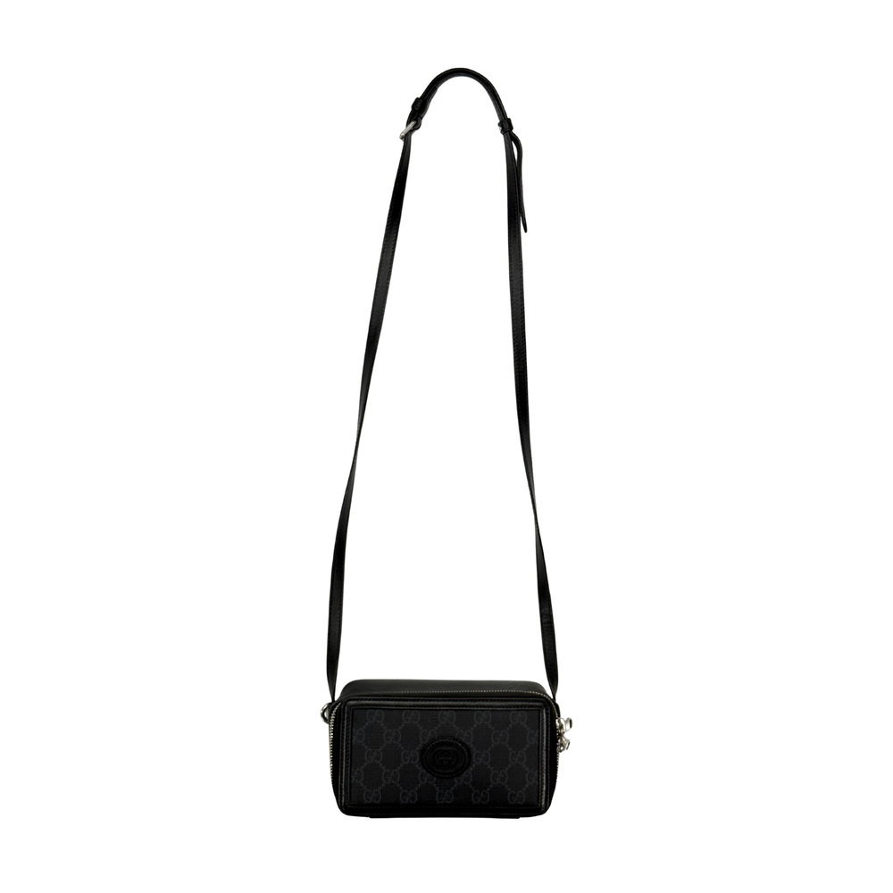 Small crossbody bag with adjustable strap, dark GG monogram canvas, zip top