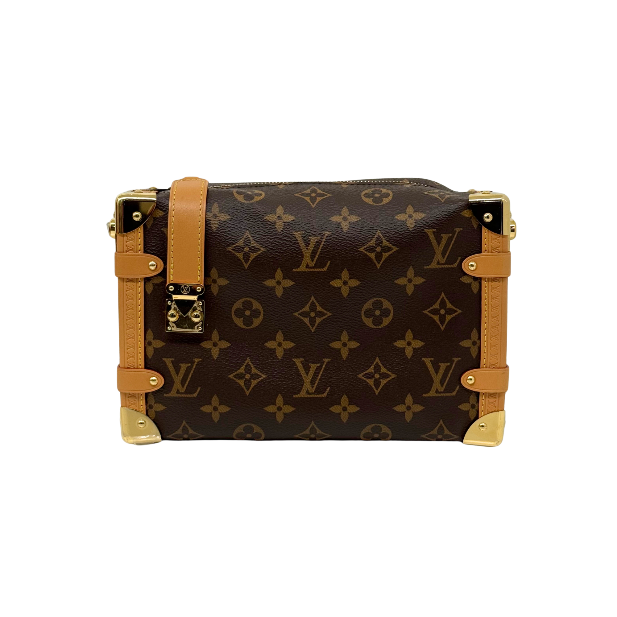 Monogram crossbody bag with tan leather corners and double front buckle straps