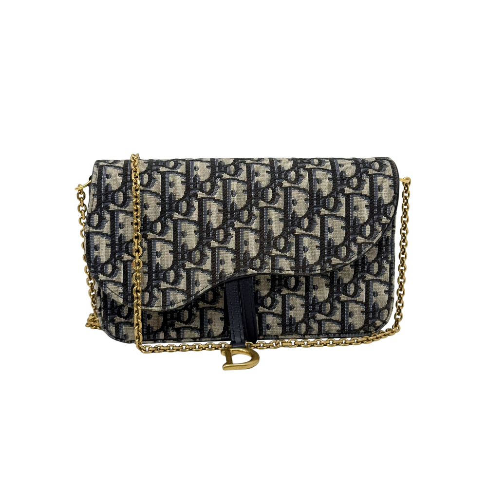 Pre-owned Dior shoulder bag with patterned canvas, flap closure, and gold chain