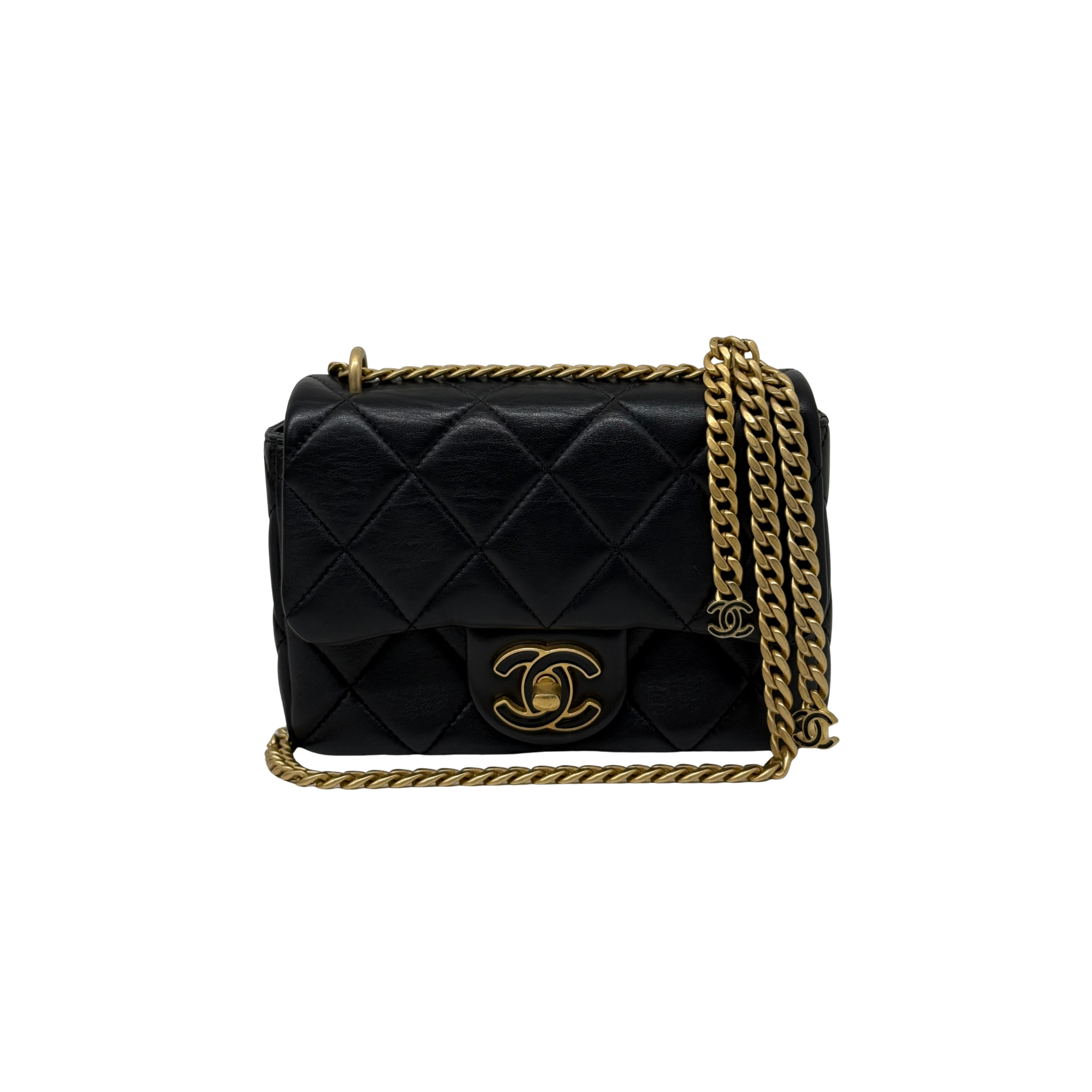 Black quilted mini shoulder bag with front CC-style turn-lock and gold chain