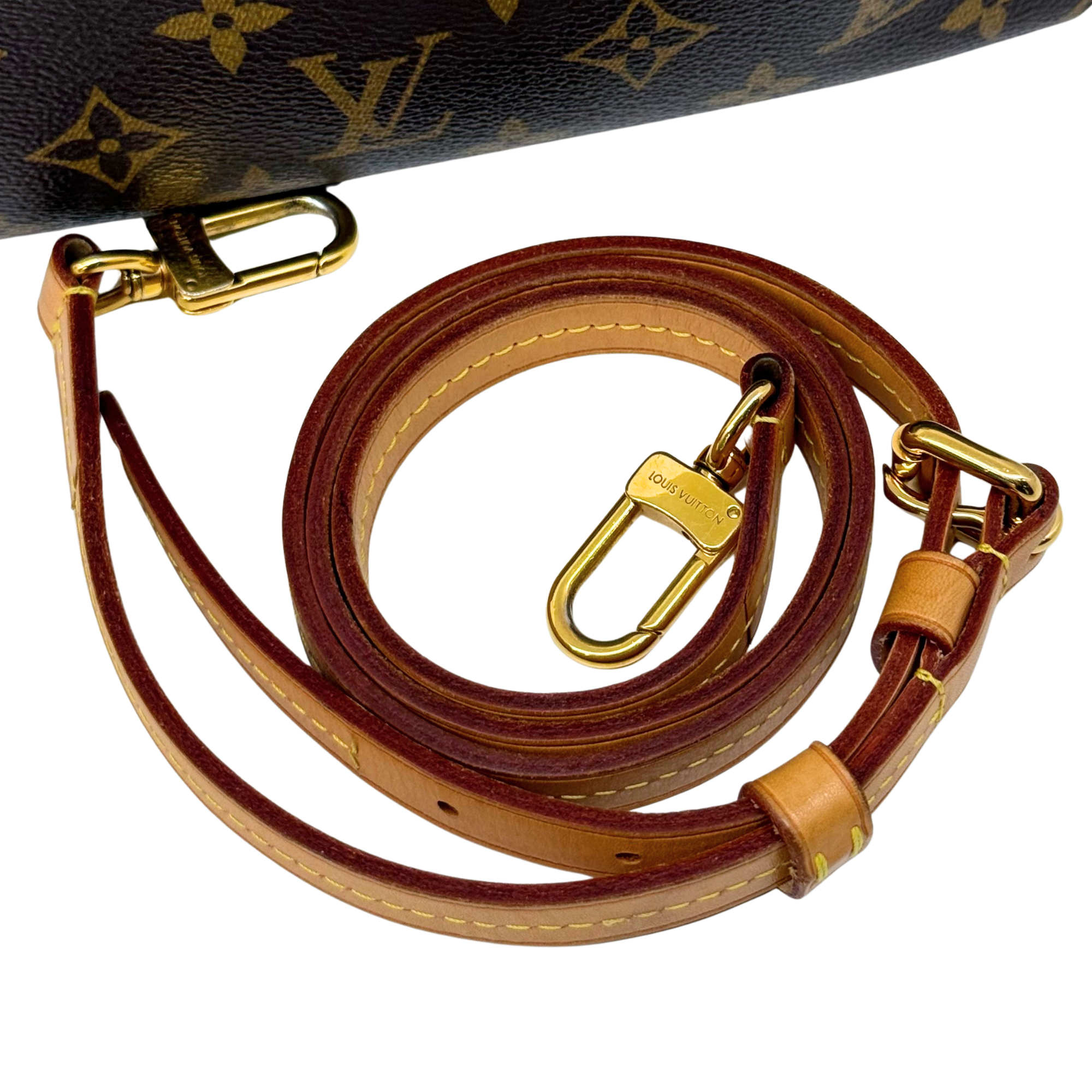 Louis Vuitton monogram strap with gold-tone clips and adjustable leather length