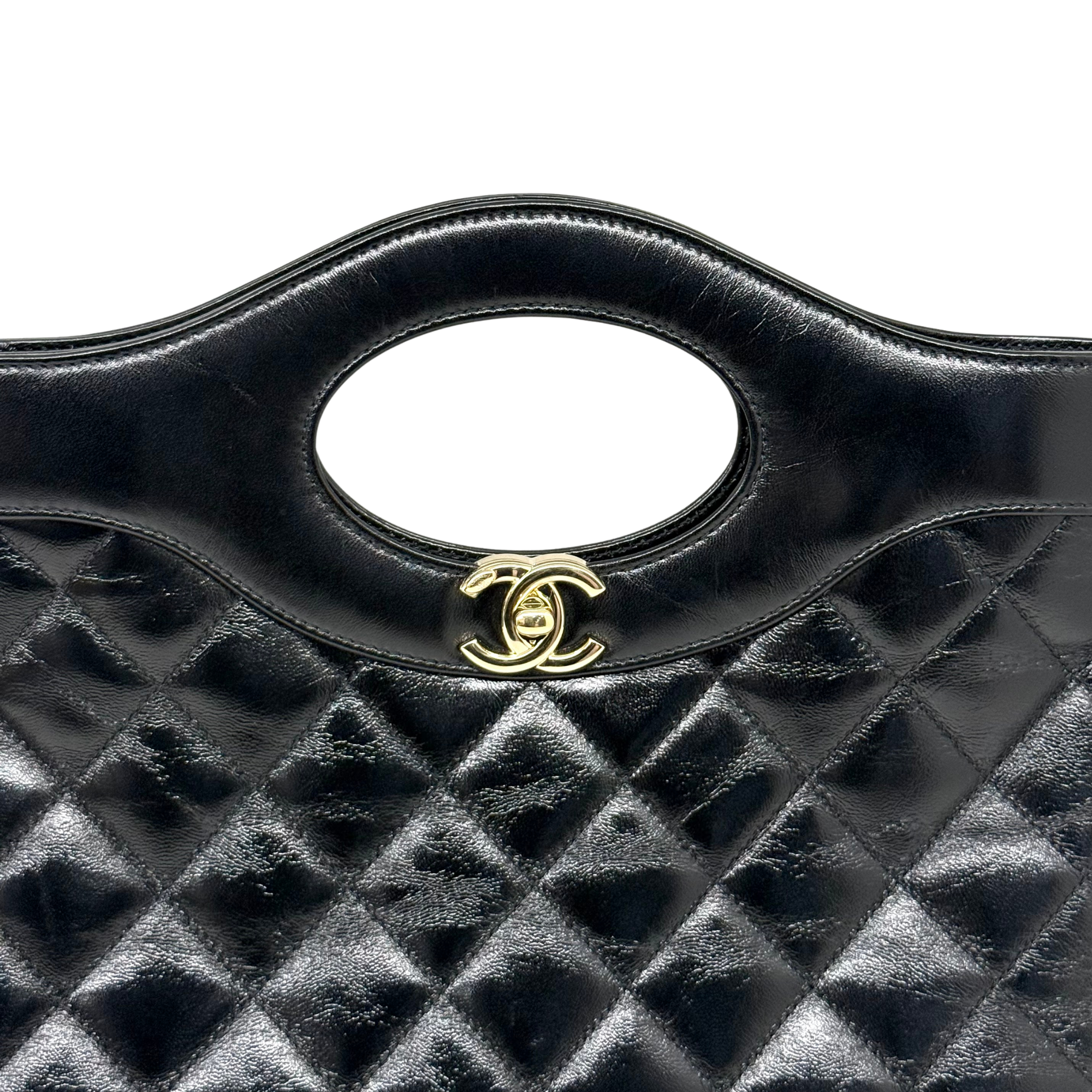 Chanel black bag leather handle