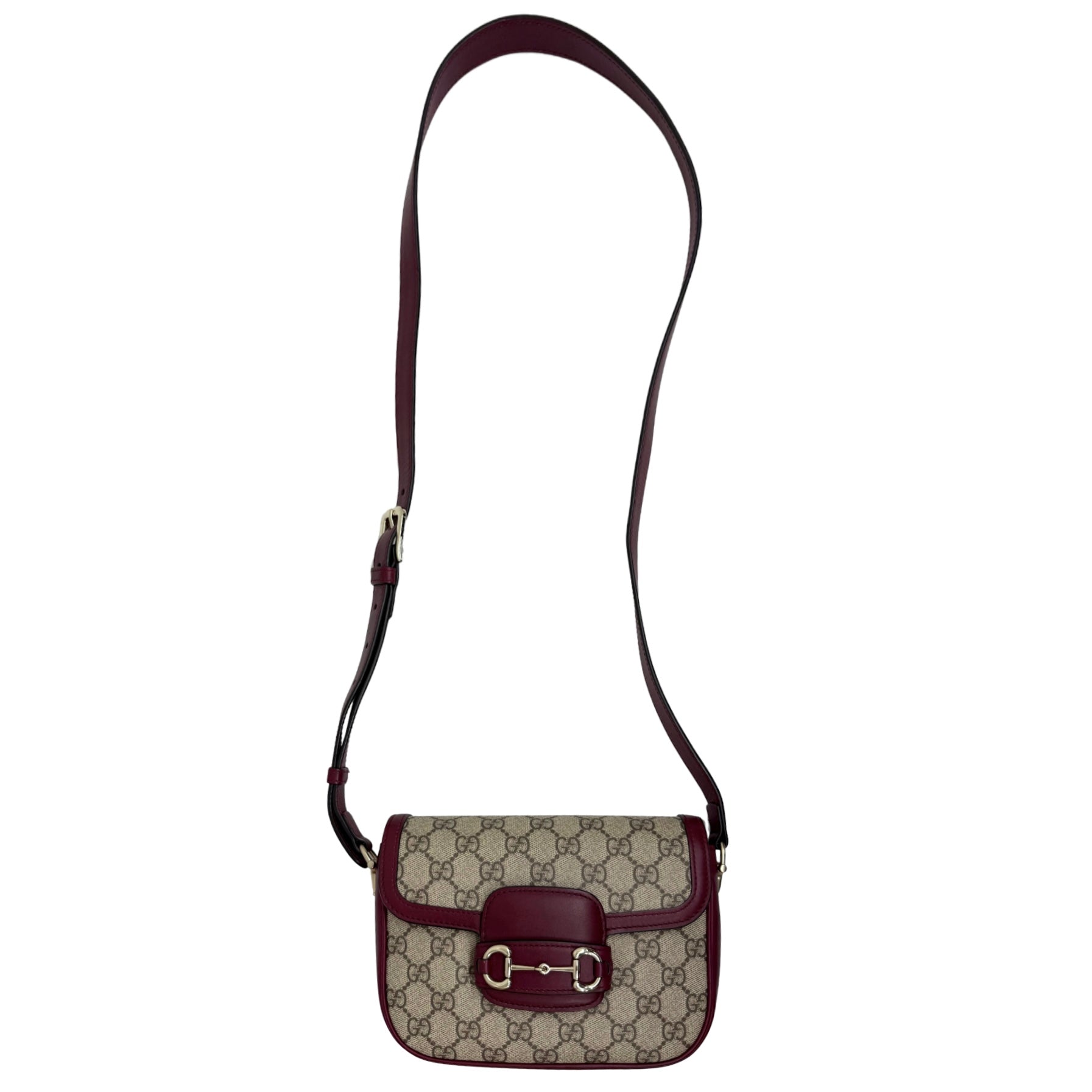 Gucci small GG crossbody bag with burgundy leather trim and flap buckle