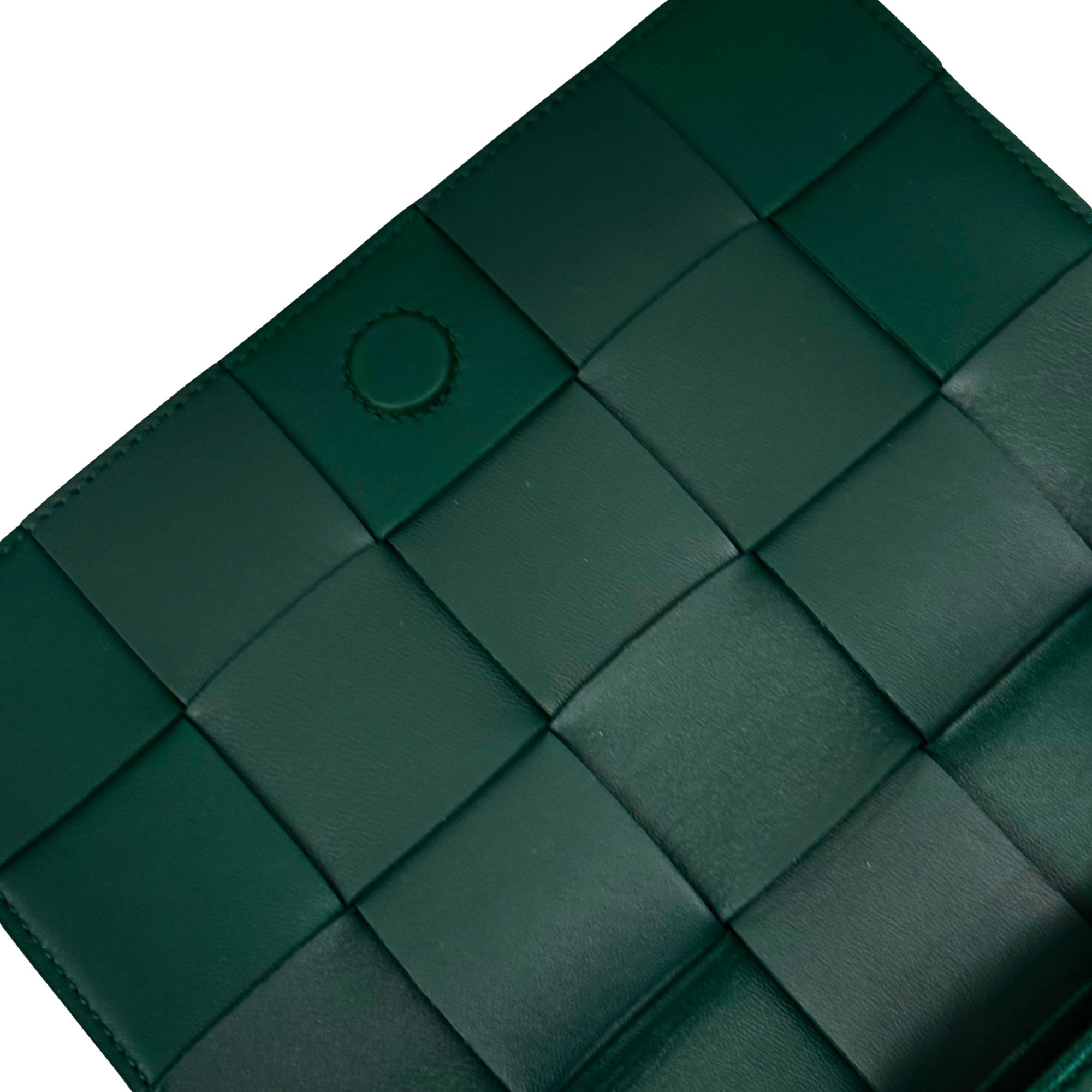 Green leather woven panel design with circular snap details
