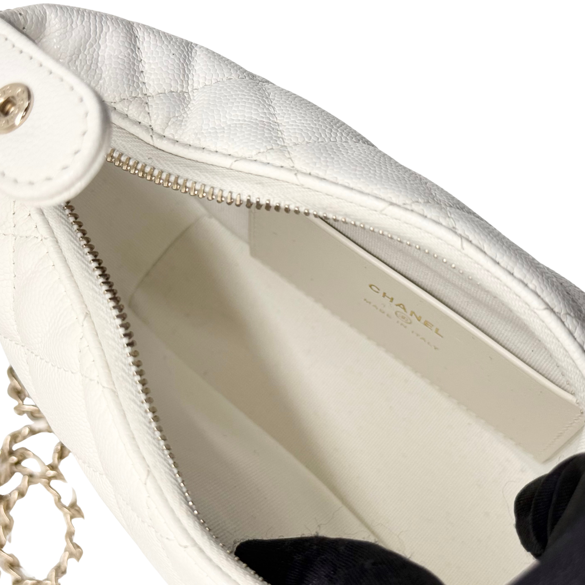 Chanel quilted bag interior lining with zipper and Chanel logo label