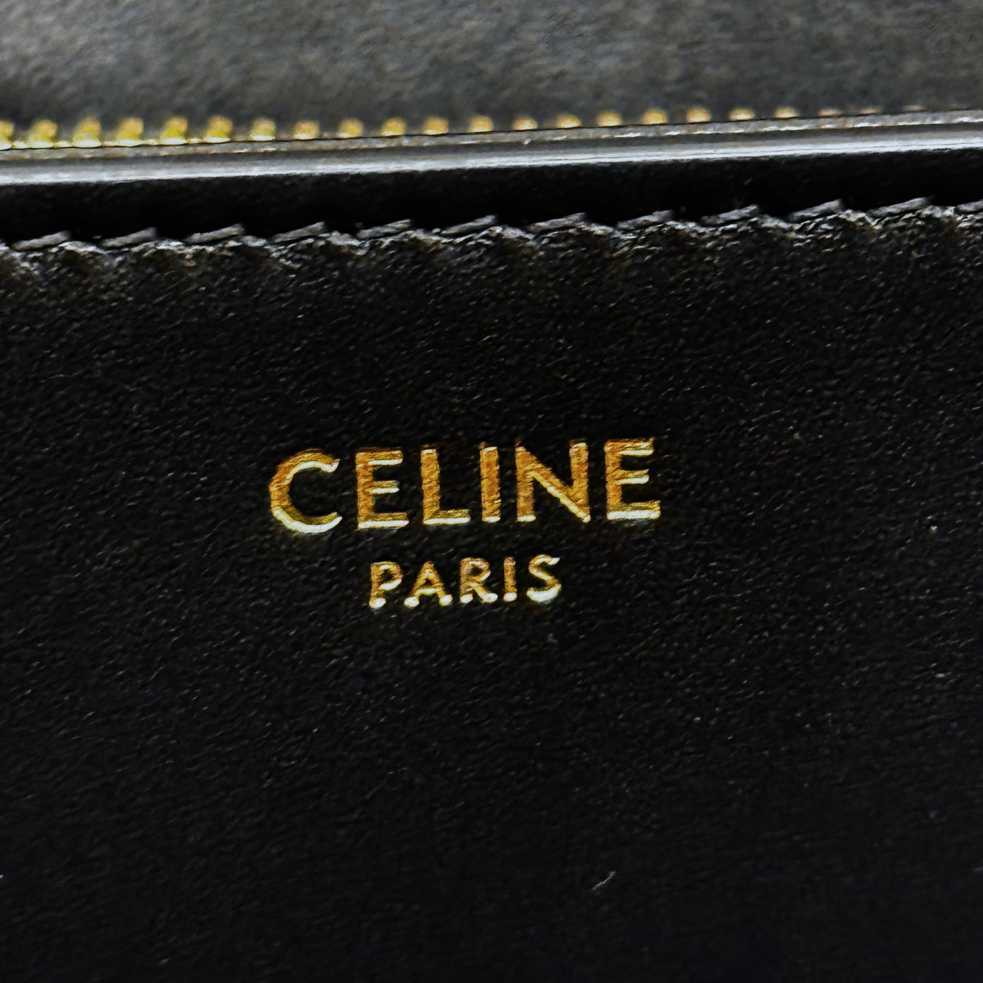 Celine Paris logo stamp on black leather exterior