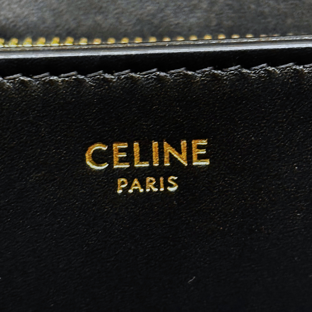 Celine Paris logo stamp on black leather exterior