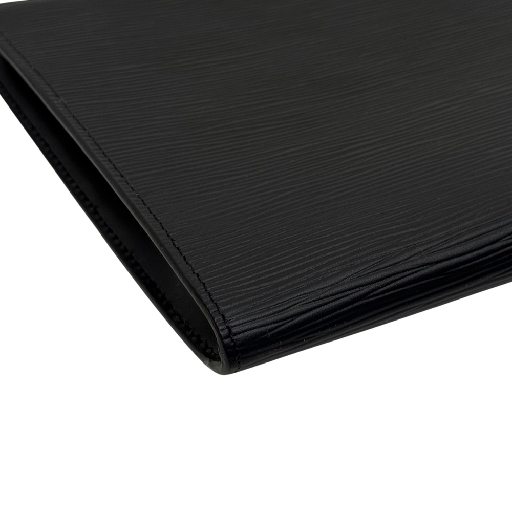 Louis Vuitton black leather wallet corner with neat edge stitching and rounded seam